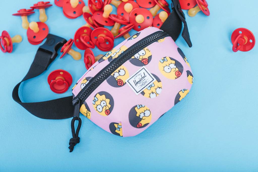 https://www.laughingplace.com/w/wp-content/uploads/2022/07/the-simpsons-x-herschel-supply-company-collection-celebrates-springfields-first-family-6.jpeg
